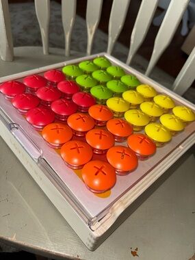 Lovevery Buttons board Toy - Red, Orange, Yellow, Green